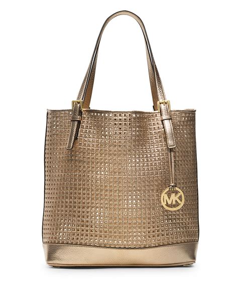 michael kors large bag gold inside|Michael Kors gold leather handbags.